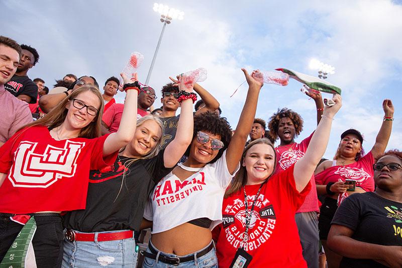 Cheering on the Lamar Cardinals